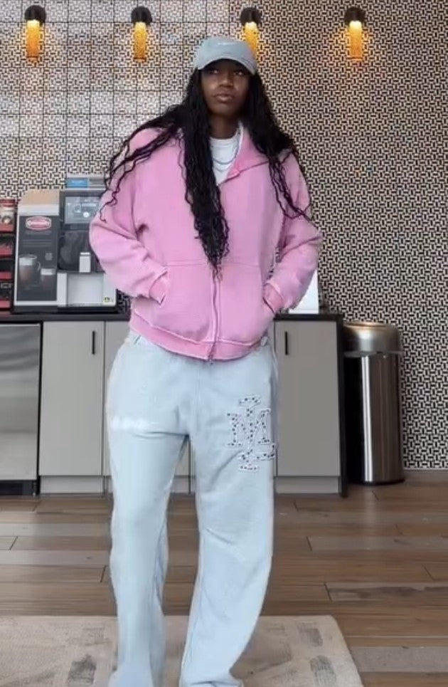 Customer wearing the Daydream hoodie in pink